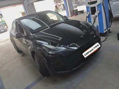 Tesla Model Y · 2024 год