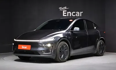 Tesla Model Y · 2025 год