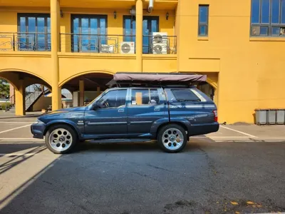 KG_Mobility_Ssangyong Musso · 2003 год
