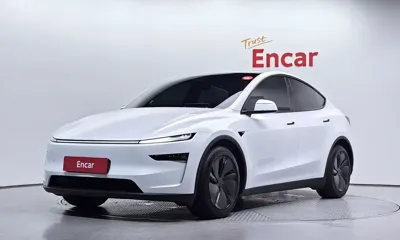 Tesla Model Y · 2025 год