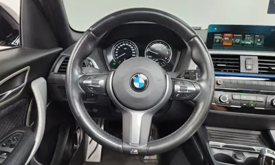 BMW 1-Series 2018, 88141 км, за 14769.59 USD - фото 12
