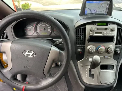 Hyundai Starex 2009, 145340 км, за 5529.54 USD - фото 8