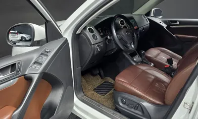 Volkswagen Tiguan 2014, 131274 км, за 4792.44 USD - фото 11