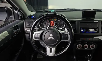 Mitsubishi Lancer Evolution 2008, 94274 км, за 12414.6 USD - фото 15