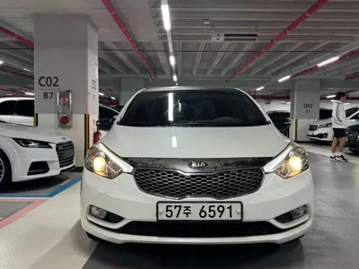 Kia K3 · 2013 год