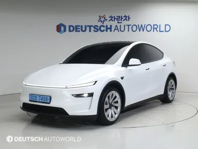 Tesla Model Y · 2025 год