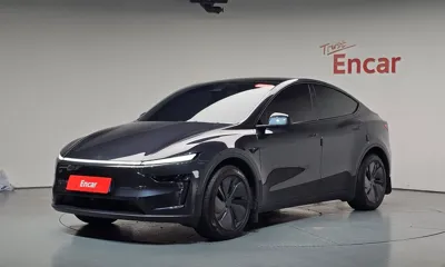Tesla Model Y · 2025 год
