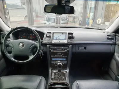 Kia Opirus 2007, 33630 км, за 3216.49 USD