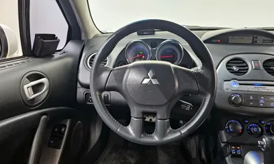 Mitsubishi Eclipse 2009, 104576 км, за 3807.27 USD - фото 12