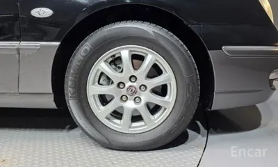 Kia Opirus 2009, 185319 км, за 2560.06 USD