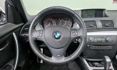 BMW 1-Series 2011, 83074 км, за 8919.72 USD - фото 13