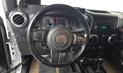 Jeep Wrangler 2011, 183338 км, за 7618.67 USD - фото 12