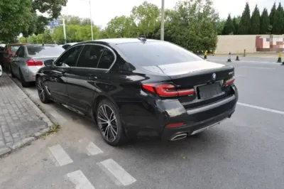 BMW 5 Series 2021, 60300 км, за 32313 USD