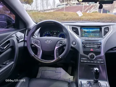 Hyundai Grandeur 2016, 132500 км, за 5883.13 USD - фото 7