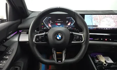 BMW 5-Series 2024, 32367 км, за 37941.45 USD - фото 14