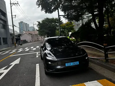 Tesla Model Y · 2025 год