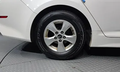 Kia K5 2014, 246000 км, за 2013.03 USD