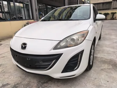 Mazda 3 · 2015 год