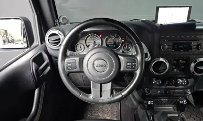 Jeep Wrangler 2011, 158721 км, за 17847.71 USD - фото 13