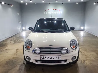 MINI Cooper 2010, 94686 км, за 2494.42 USD