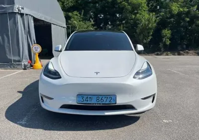 Tesla Model Y · 2023 год
