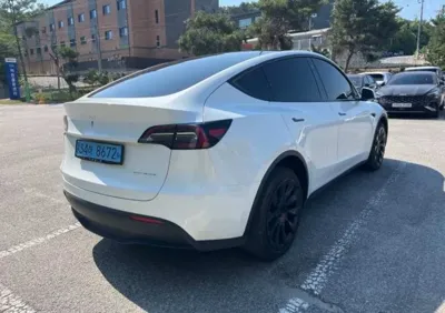 Tesla Model Y 2023, 39228 км, за 5869.91 USD