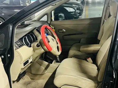 Nissan Tiida 2009, 180000 км, за 1437.92 USD