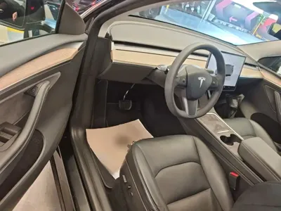 Tesla Model Y 2023, 82300 км, за 24587.52 USD - фото 16