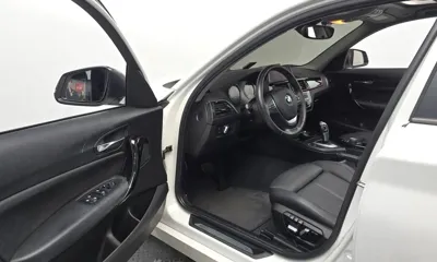 BMW 1-Series 2018, 66332 км, за 10444.22 USD - фото 10
