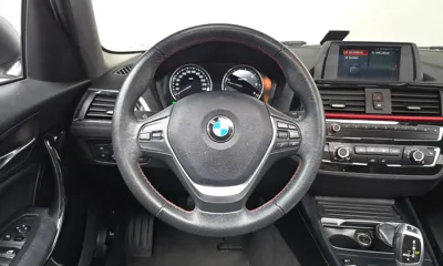 BMW 1-Series 2018, 66332 км, за 10444.22 USD - фото 13