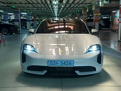 Porsche Taycan 2021, 66161 км, за 73907.63 USD